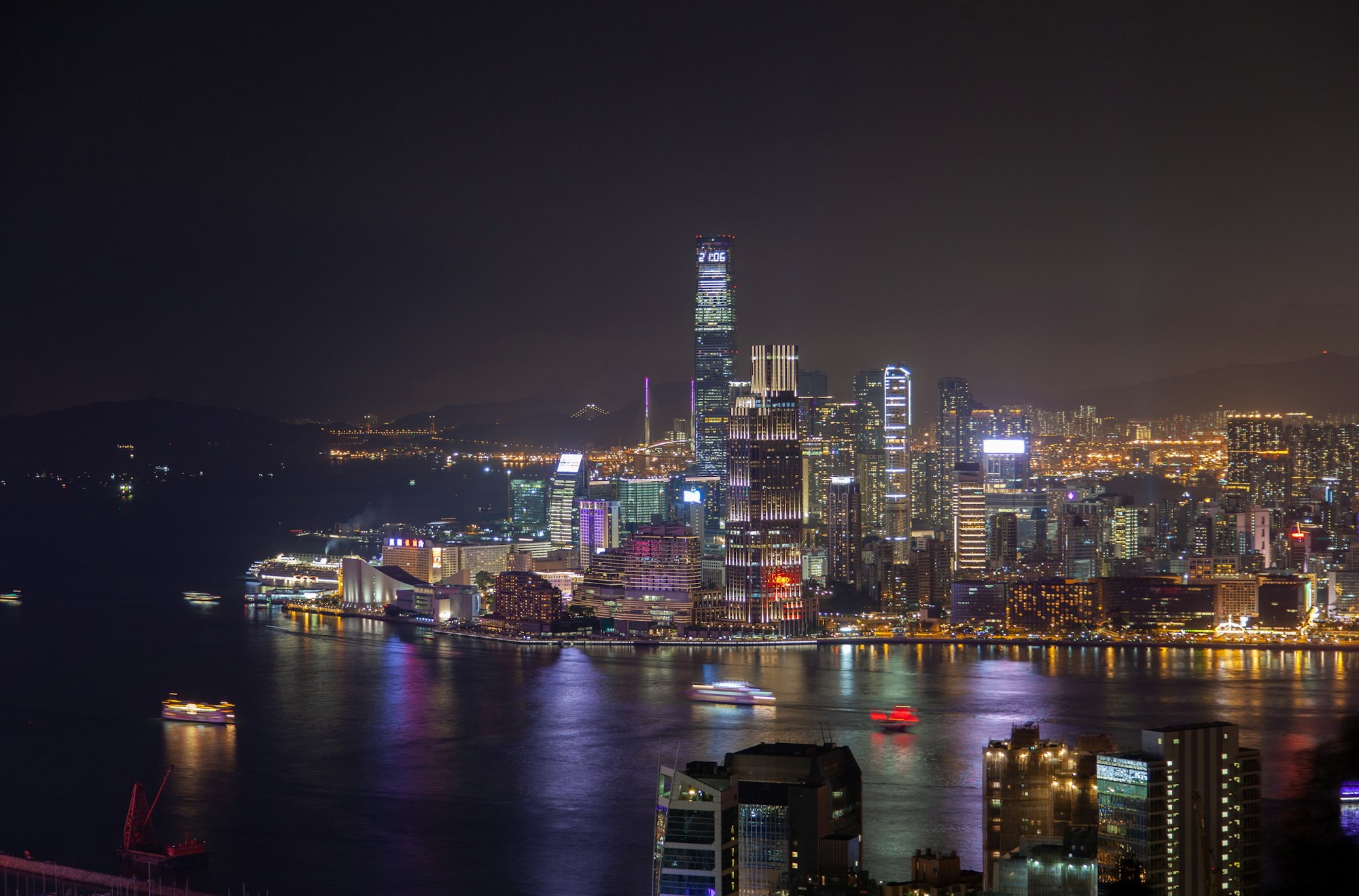 Cityscape Hong Kong districts with coloured illumination