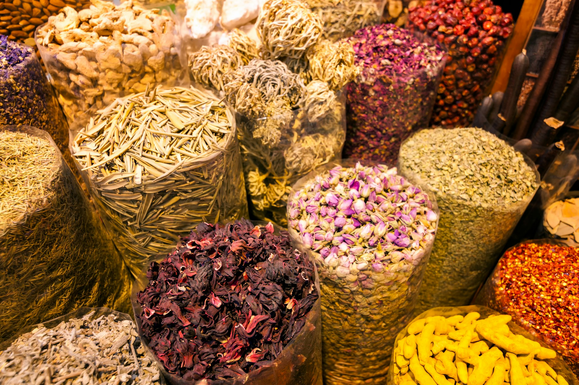 Dubai creek district Deira with different baskets full of spices, Dubai, United Arab Emirates.