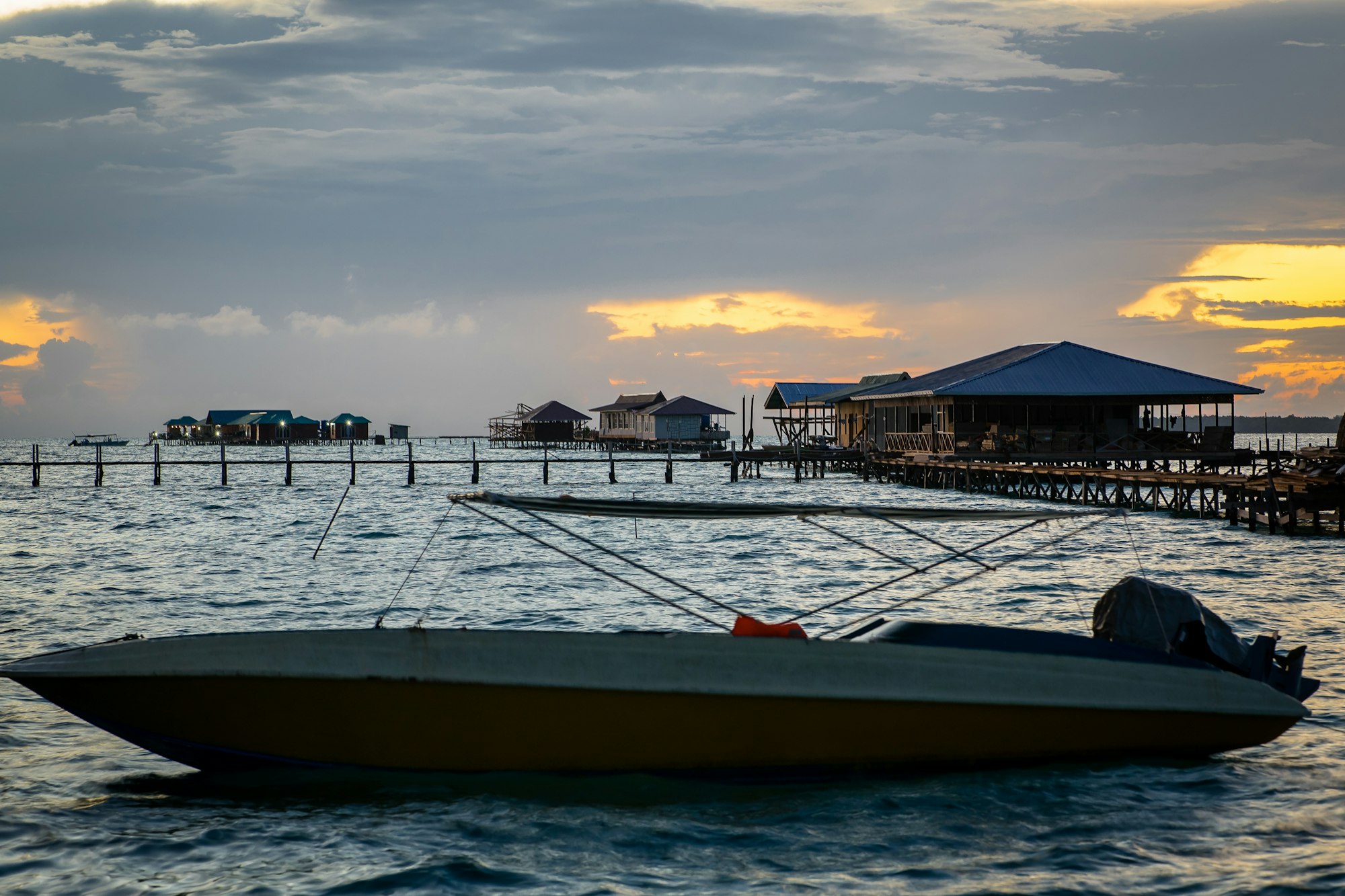 Water bungalows and chalets during sunrise in Semporna, Sabah.