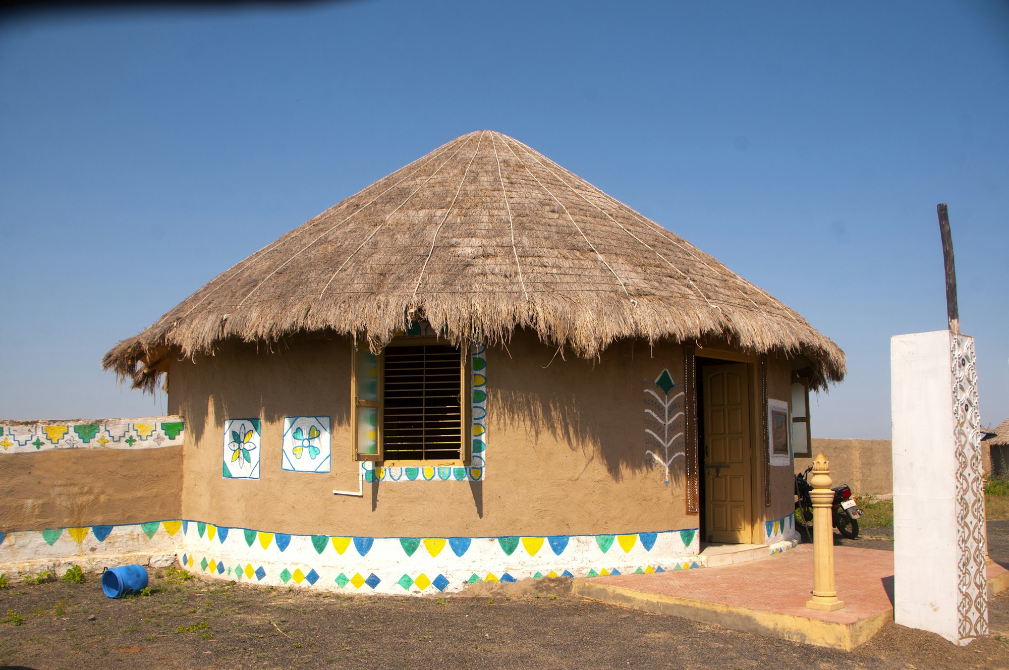 Exterior of decorative traditional mud house, Kutch, Gujarat, India.